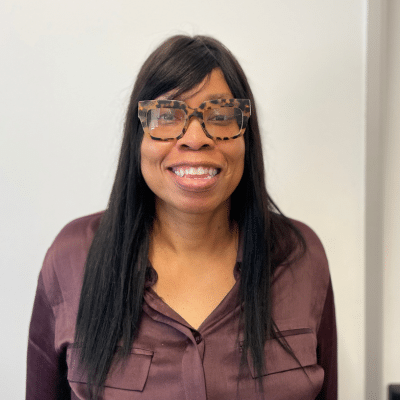 Headshot of Lynnette Hollins. HomeRise staff.