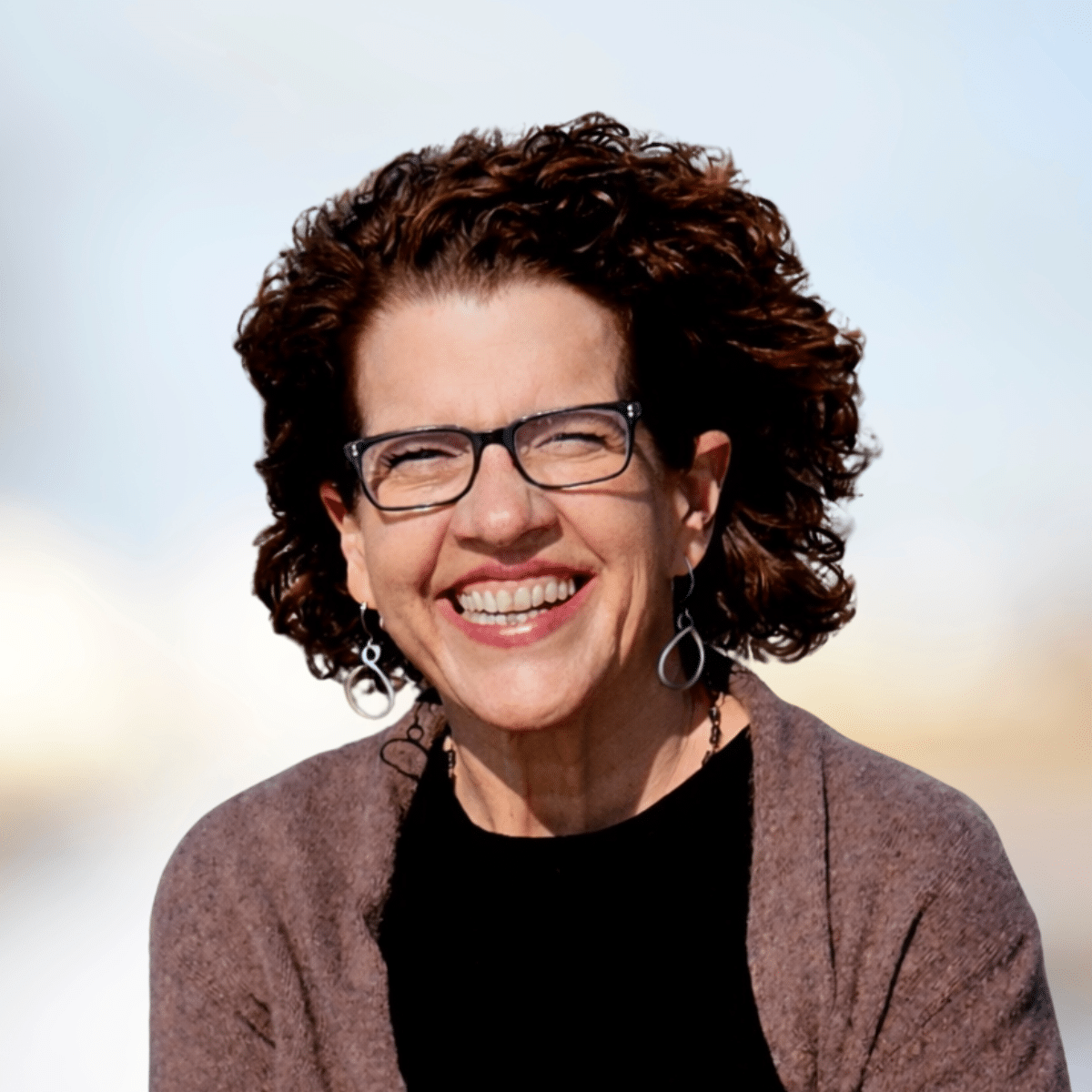 Headshot of Eileen Myers. HomeRise staff.